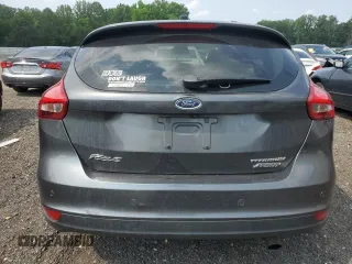 2018 Ford Focus Titanium z VIN 1FADP3N20JL271719, wystawiony jako Copart lot #60784755 z przebiegiem 116 118 mil mil oraz Szkoda całkowita • Salvage title. Historia ofert i sprzedaży dostępna na DreamBid. Obrazek 6.