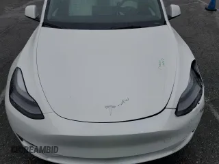 2023 Tesla Model Y Performance with VIN 7SAYGDEF1PF809654, listed as a Copart auction lot 43981915 with 16,401 mi miles and Salvage Title. Bid and sale history available at DreamBid. Image 12.