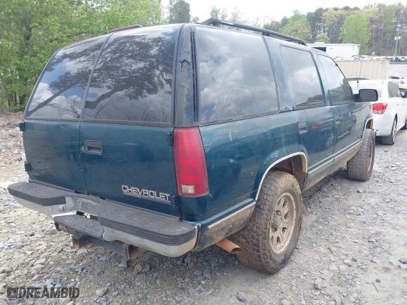 1995 Chevrolet Tahoe with VIN 1GNEK13K3SJ412971, listed as a IAAI auction lot 41940461 with 425,128 mi miles. Bid and sale history available at carsss.com. Image 4.
