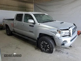 2007 Toyota Tacoma z VIN 5TEMU52N27Z372431, wystawiony jako Copart lot #56699575 z przebiegiem 284 462 mil mil oraz Szkoda całkowita • Salvage title. Historia ofert i sprzedaży dostępna na DreamBid. Obrazek 4.