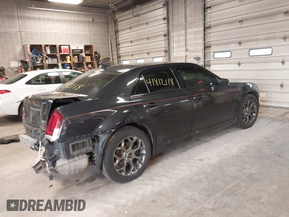2015 Chrysler 300 with VIN 2C3CCAGG9FH864678, listed as a IAAI auction lot 41812118 with 107,873 mi miles. Bid and sale history available at carsss.com. Image 4.