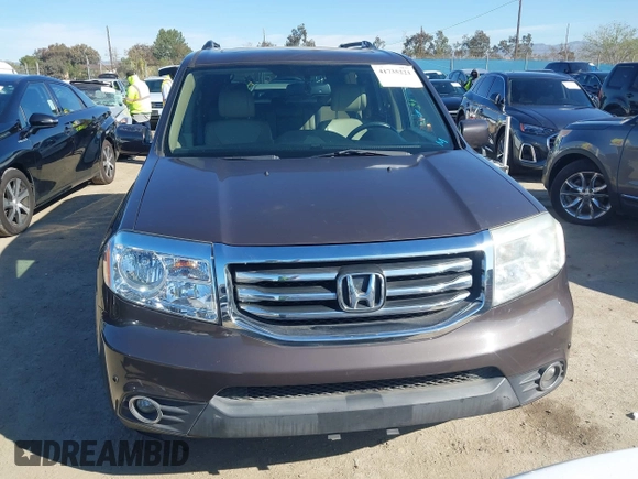 2015 Honda Pilot Touring with VIN 5FNYF3H94FB002236, listed as a IAAI auction lot 41735221 with 112,766 mi miles. Bid and sale history available at carsss.com. Image 12.