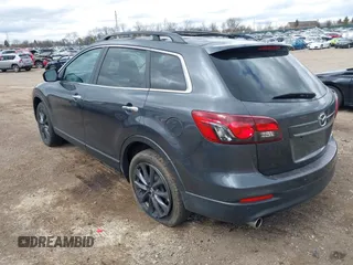 2015 Mazda CX-9 Grand Touring with VIN JM3TB3DV1F0465966, listed as a IAAI auction lot 42049749 with 74,470 mi miles and . Bid and sale history available at DreamBid. Image 3.