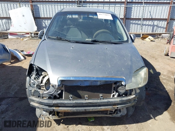 2007 Chevrolet Aveo LS z VIN KL1TD566X7B087387, wystawiony jako IAAI lot #41673057 z przebiegiem 160 577 mil mil oraz . Historia ofert i sprzedaży dostępna na DreamBid. Obrazek 13.