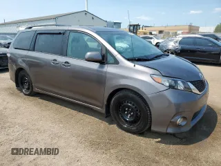 2011 Toyota Sienna SE with VIN 5TDXK3DC2BS175090, listed as a Copart auction lot 62560875 with 250,496 mi miles and Salvage title. Bid and sale history available at DreamBid. Image 4.