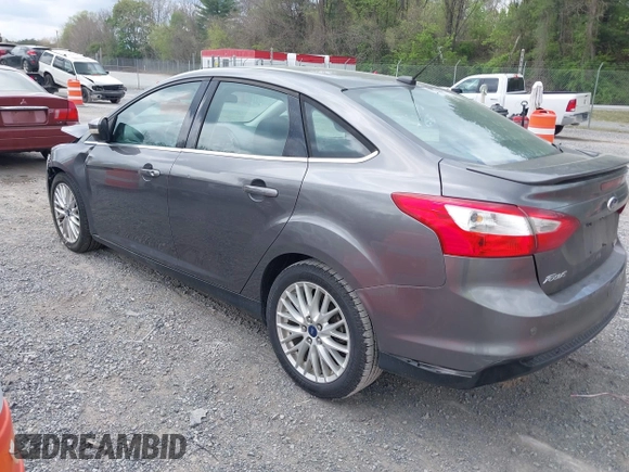 2013 Ford Focus Titanium with VIN 1FADP3J28DL225887, listed as a IAAI auction lot 42122968 with 139,248 mi miles and . Bid and sale history available at carsss.com. Image 3.