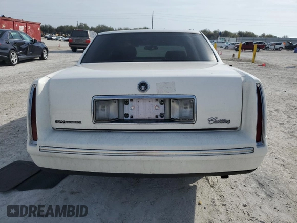 1998 Cadillac DeVille with VIN 1G6KD54Y7WU721351, listed as a Copart auction lot 42990425 with 98,666 mi miles and Salvage Title. Bid and sale history available at carsss.com. Image 6.
