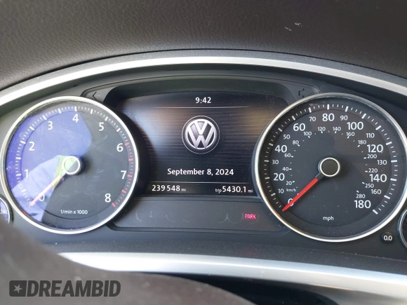 2013 Volkswagen Touareg Lux with VIN WVGEF9BP6DD004454, listed as a IAAI auction lot 41862958 with 239,548 mi miles and . Bid and sale history available at DreamBid. Image 7.
