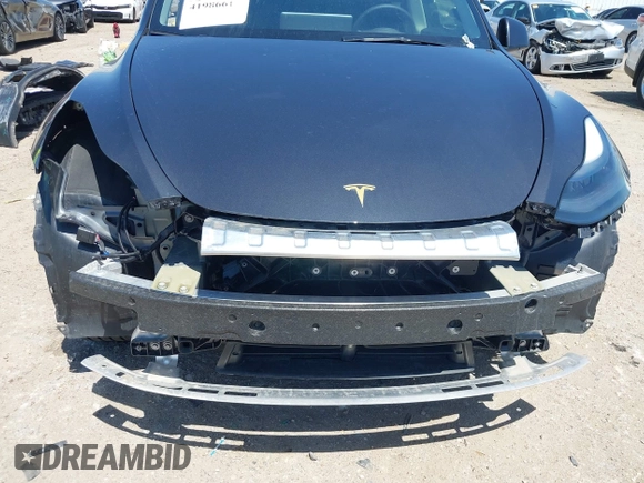 2024 Tesla Model Y with VIN 7SAYGDED2RF040745, listed as a IAAI auction lot 41986613 with 9,778 mi miles and . Bid and sale history available at DreamBid. Image 6.