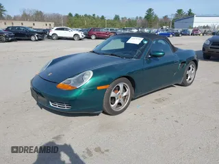 2001 Porsche Boxster z VIN WP0CA29831U623833, wystawiony jako IAAI lot #42075731 z przebiegiem 69 922 mil mil oraz . Historia ofert i sprzedaży dostępna na DreamBid. Obrazek 2.