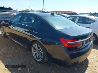 2019 BMW 7 Series 740i xDrive with VIN WBA7E4C57KGV70521, listed as a IAAI auction lot 41881538 with 114,480 mi miles and . Bid and sale history available at DreamBid. Image 3.
