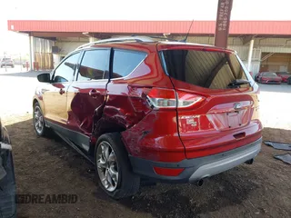 2013 Ford Escape Titanium with VIN 1FMCU0J96DUB08681, listed as a IAAI auction lot 42068864 with 102,094 mi miles and . Bid and sale history available at carsss.com. Image 3.