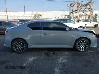 2014 Scion tC with VIN JTKJF5C7XE3079765, listed as a IAAI auction lot 41210220 with 114,410 mi miles. Bid and sale history available at carsss.com. Image 13.
