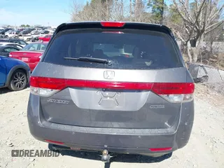 2014 Honda Odyssey Touring with VIN 5FNRL5H92EB016546, listed as a IAAI auction lot 41689148 with 143,601 mi miles and . Bid and sale history available at DreamBid. Image 16.