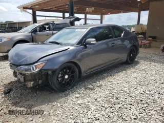 2015 Scion tC z VIN JTKJF5C76FJ001402, wystawiony jako Copart lot #56208615 z przebiegiem 190 833 mil mil oraz Szkoda całkowita • Salvage title. Historia ofert i sprzedaży dostępna na DreamBid. Obrazek 1.