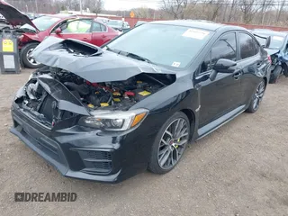 2020 Subaru WRX STI z VIN JF1VA2E6XL9818207, wystawiony jako IAAI lot #41929778 z przebiegiem 33 363 mil mil oraz . Historia ofert i sprzedaży dostępna na DreamBid. Obrazek 2.