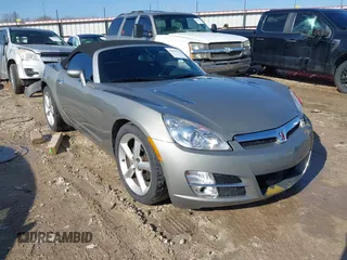 2009 Saturn Sky z VIN 1G8MN35B69Y103110, wystawiony jako IAAI lot #41651727 z przebiegiem 61 715 mil mil oraz . Historia ofert i sprzedaży dostępna na DreamBid. Obrazek 1.