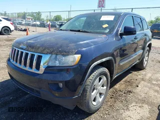 2011 Jeep Grand Cherokee Laredo with VIN 1J4RR4GG8BC525701, listed as a IAAI auction lot 42240431 with 198,921 mi miles and . Bid and sale history available at DreamBid. Image 2.