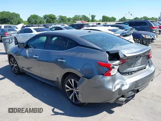 2016 Nissan Maxima SR with VIN 1N4AA6AP9GC414943, listed as a IAAI auction lot 41976295 with 154,738 mi miles and . Bid and sale history available at DreamBid. Image 3.
