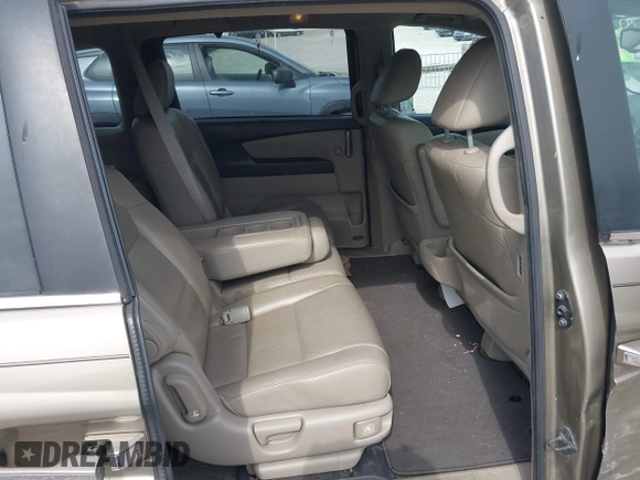 2013 Honda Odyssey EX-L with VIN 5FNRL5H65DB064238, listed as a IAAI auction lot 42050743 with 189,437 mi miles and . Bid and sale history available at carsss.com. Image 8.