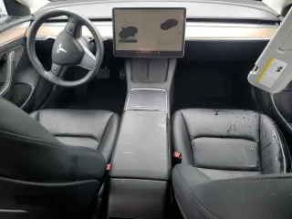 2023 Tesla Model 3 with VIN 5YJ3E1EA2PF671865, listed as a Copart auction lot 45220285 with 29,614 mi miles and Salvage title. Bid and sale history available at DreamBid. Image 8.