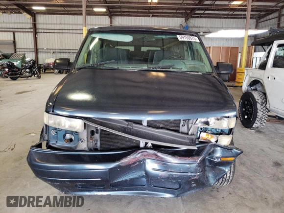 1995 Chevrolet Astro Cargo z VIN 1GBDM19W6SB155022, wystawiony jako Copart lot #59150675 z przebiegiem 135 647 mil mil oraz Szkoda całkowita • Salvage title. Historia ofert i sprzedaży dostępna na DreamBid. Obrazek 5.