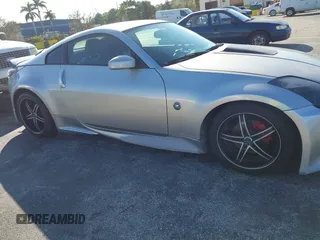 2003 Nissan 350Z Touring z VIN JN1AZ34E23T019866, wystawiony jako IAAI lot #41293510 z przebiegiem 118 416 mil mil oraz . Historia ofert i sprzedaży dostępna na DreamBid. Obrazek 6.