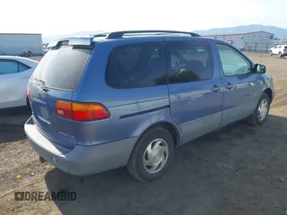 2000 Toyota Sienna LE with VIN 4T3ZF13C2YU183815, listed as a IAAI auction lot 42462319 with 217,175 mi miles and . Bid and sale history available at DreamBid. Image 4.