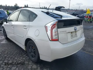 2015 Toyota Prius Four z VIN JTDKN3DU4F1883032, wystawiony jako IAAI lot #41528573 z przebiegiem 104 056 mil mil oraz . Historia ofert i sprzedaży dostępna na DreamBid. Obrazek 3.