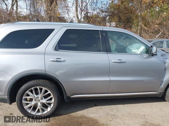 2014 Dodge Durango Citadel z VIN 1C4SDJET5EC509366, wystawiony jako IAAI lot #40735205 z przebiegiem 149 644 mil mil oraz . Historia ofert i sprzedaży dostępna na DreamBid. Obrazek 12.