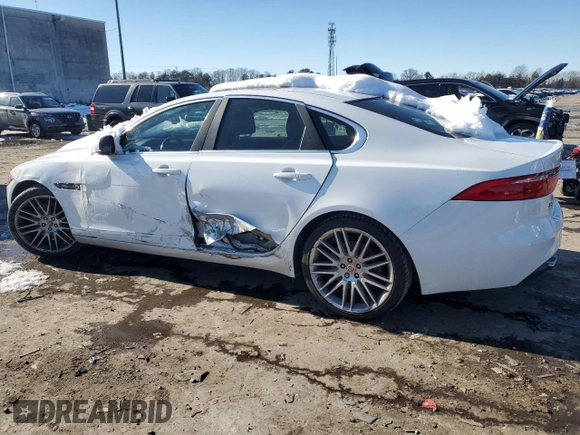 2016 Jaguar XF 35t Prestige with VIN SAJBK4BV3GCY21901, listed as a Copart auction lot 87926165 with 140,124 mi miles and Salvage Title. Bid and sale history available at carsss.com. Image 2.
