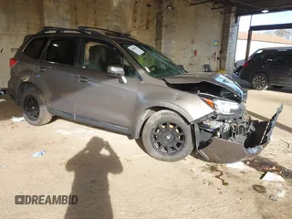 2017 Subaru Forester Touring z VIN JF2SJATC4HH417007, wystawiony jako IAAI lot #41806015 z przebiegiem 175 860 mil mil oraz . Historia ofert i sprzedaży dostępna na DreamBid. Obrazek 1.