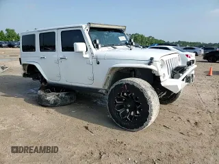 2015 Jeep Wrangler Unlimited Sport with VIN 1C4BJWDG9FL759012, listed as a Copart auction lot 61002465 with 101,395 mi miles and Salvage title. Bid and sale history available at DreamBid. Image 14.