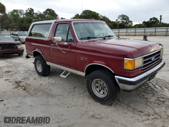 1990 Ford Bronco Custom with VIN 1FMEU15H2LLA70449, listed as a Copart auction lot 77953604 with 12,519 mi miles and Salvage Title. Bid and sale history available at DreamBid. Image 4.