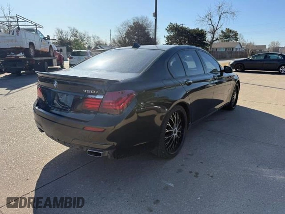 2013 BMW 7 Series 750i with VIN WBAYA8C5XDC996785, listed as a Copart auction lot 48892145 with 134,427 mi miles and Clean Title. Bid and sale history available at DreamBid. Image 4.