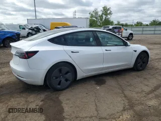 2023 Tesla Model 3 with VIN 5YJ3E1EA0PF575488, listed as a Copart auction lot 56889115 with 18,677 mi miles and Clean title. Bid and sale history available at DreamBid. Image 3.