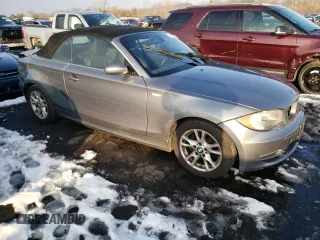 2009 BMW 1 Series 128i with VIN WBAUN13569VH80991, listed as a Copart auction lot 43225685 with 104,652 mi miles and Salvage Title. Bid and sale history available at DreamBid. Image 4.