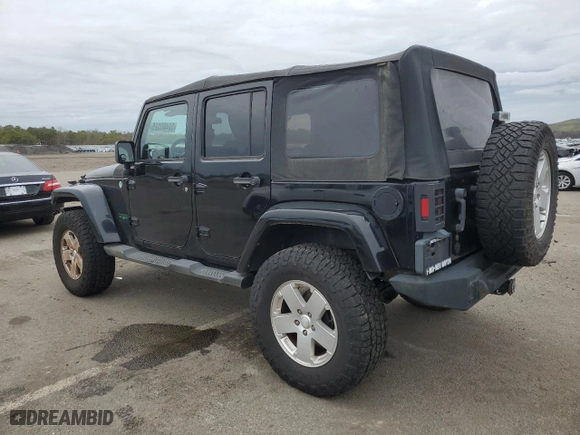 2011 Jeep Wrangler Unlimited Sahara with VIN 1J4HA5H14BL507148, listed as a Copart auction lot 52480325 with 233,835 mi miles and Clean Title. Bid and sale history available at carsss.com. Image 2.