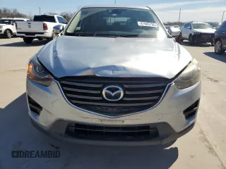 2016 Mazda CX-5 Grand Touring with VIN JM3KE2DYXG0717982, listed as a Copart auction lot 47405735 with 182,556 mi miles and Salvage Title. Bid and sale history available at carsss.com. Image 5.