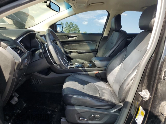 2015 Ford Edge Titanium z VIN 2FMTK4K88FBB56310, wystawiony jako Copart lot #53851524 z przebiegiem 170 380 mil mil oraz Szkody całkowita. Historia ofert i sprzedaży dostępna na DreamBid. Obrazek 7.