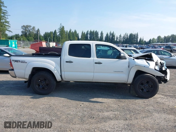 2015 Toyota Tacoma with VIN 3TMLU4EN5FM182720, listed as a IAAI auction lot 42555728 with 183,081 mi miles and . Bid and sale history available at DreamBid. Image 13.