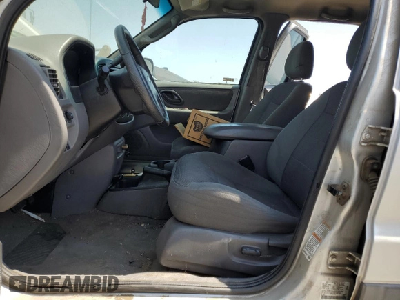 2002 Ford Escape XLT z VIN 1FMCU03152KC58829, wystawiony jako Copart lot #61541644 z przebiegiem Nie podano mil oraz Czysty tytuł • Clean title. Historia ofert i sprzedaży dostępna na DreamBid. Obrazek 7.