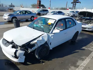 2002 Toyota Corolla CE with VIN 2T1BR12EX2C523872, listed as a IAAI auction lot 41831610 with Not provided miles and . Bid and sale history available at DreamBid. Image 2.