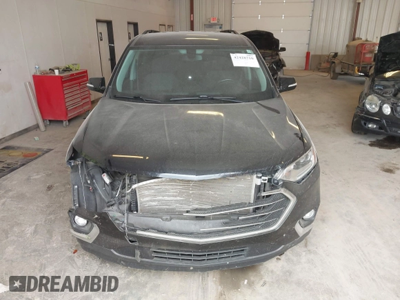 2019 Chevrolet Traverse LT Cloth z VIN 1GNEVGKW6KJ313527, wystawiony jako IAAI lot #42428710 z przebiegiem 117 306 mil mil oraz . Historia ofert i sprzedaży dostępna na DreamBid. Obrazek 12.