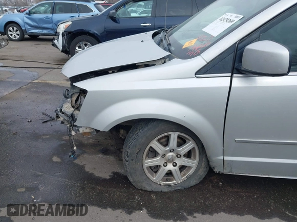 2010 Chrysler Town & Country Touring with VIN 2A4RR5D12AR208914, listed as a IAAI auction lot 41529269 with Not Provided miles and . Bid and sale history available at DreamBid. Image 6.