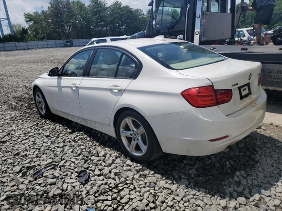 2014 BMW 3 Series 320i xDrive with VIN WBA3C3C51EF983592, listed as a Copart auction lot 60608765 with 195,061 mi miles and Salvage title. Bid and sale history available at DreamBid. Image 2.