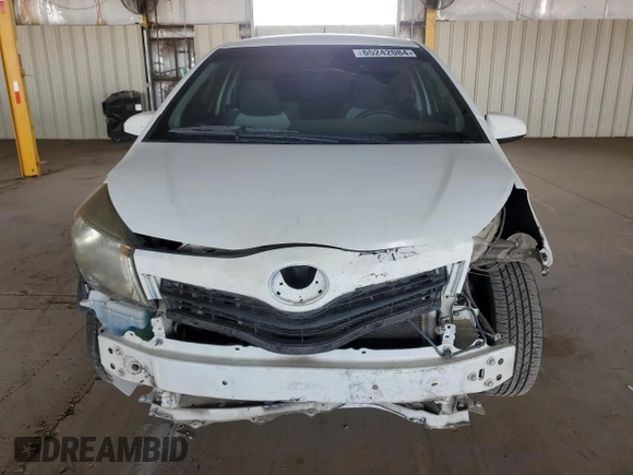 2014 Toyota Yaris L with VIN JTDJTUD31ED583248, listed as a Copart auction lot 65242084 with 163,573 mi miles and Clean Title. Bid and sale history available at carsss.com. Image 5.