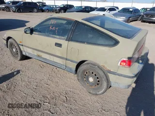 1989 Honda Civic z VIN JHMED8368KS023055, wystawiony jako IAAI lot #42017265 z przebiegiem 191 370 mil mil oraz . Historia ofert i sprzedaży dostępna na DreamBid. Obrazek 3.