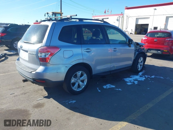 2014 Subaru Forester Premium with VIN JF2SJAEC4EH555249, listed as a IAAI auction lot 41369482 with 175,734 mi miles and . Bid and sale history available at DreamBid. Image 4.