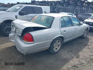 2002 Ford Crown Victoria LX z VIN 2FAFP74W42X100691, wystawiony jako IAAI lot #41316550 z przebiegiem 193 517 mil mil oraz . Historia ofert i sprzedaży dostępna na DreamBid. Obrazek 4.